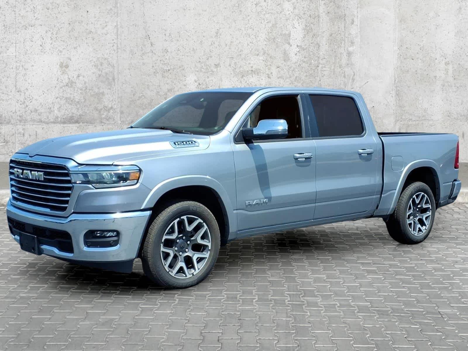 2026 RAM 1500 Laramie in Billet Silver Metallic Clearcoat — front three-quarter view