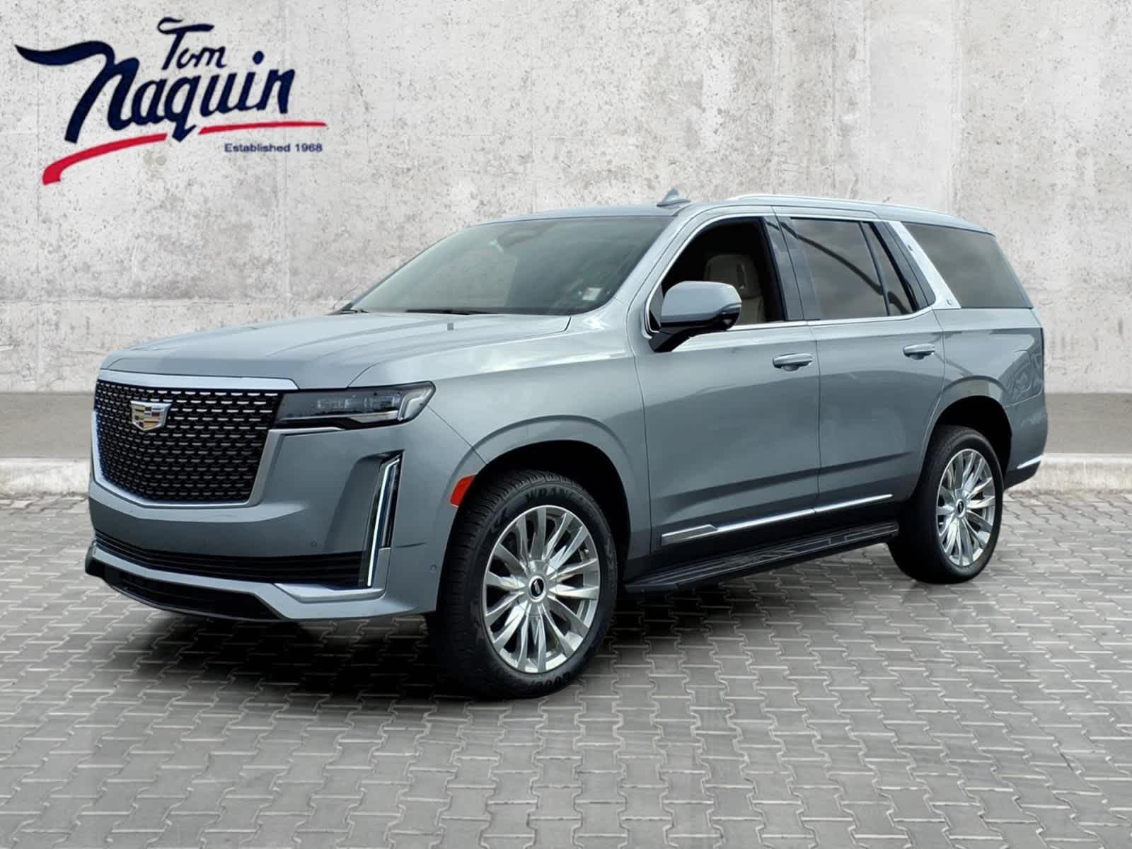 2023 Cadillac Escalade 4WD Premium Luxury in Argent Silver Metallic — front three-quarter view