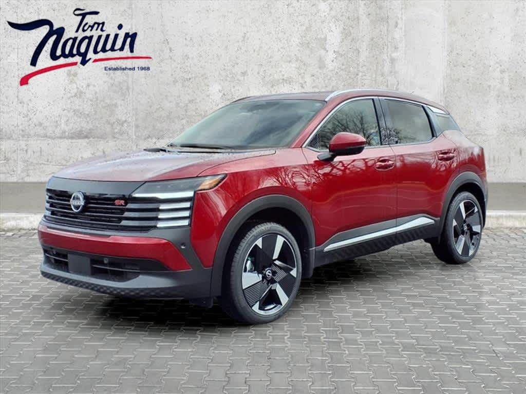 2025 Nissan Kicks SR in Scarlet Ember Tintcoat — front three-quarter view