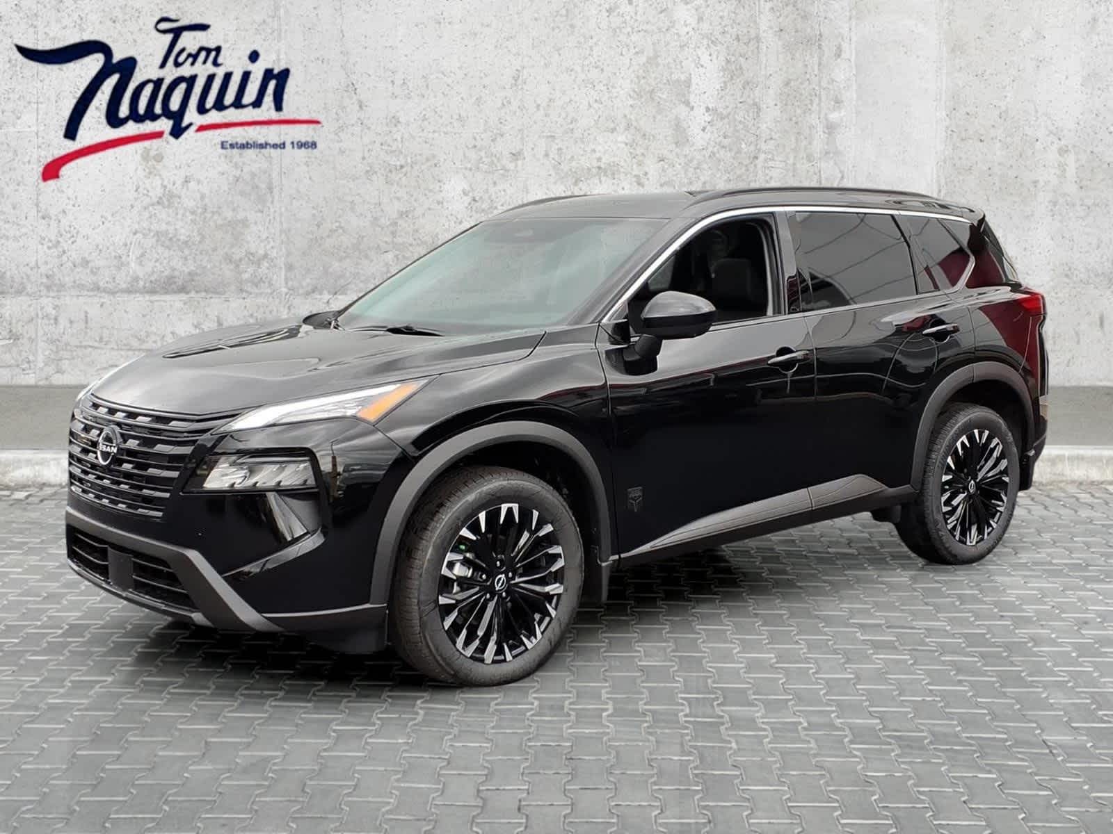 2026 Nissan Rogue Dark Armor in Super Black — front three-quarter view