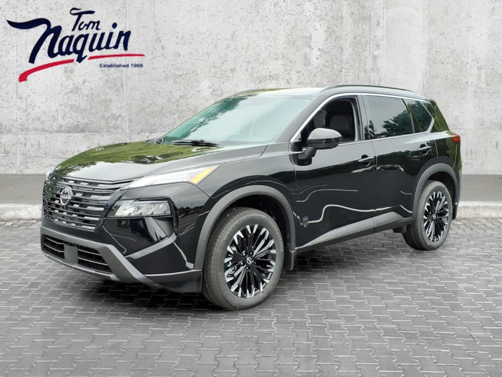 2026 Nissan Rogue Dark Armor in Super Black — front three-quarter view